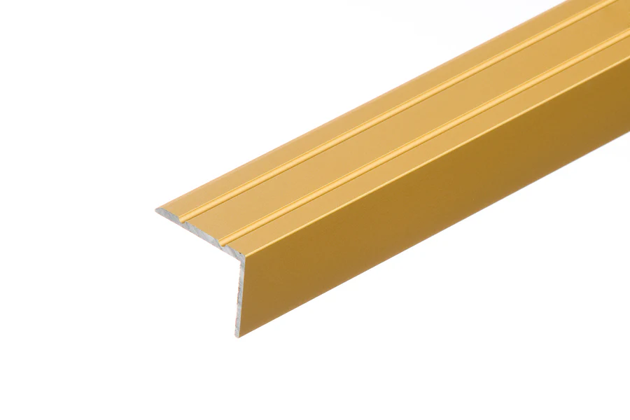 Profil schodowy narożny klejony aluminium anoda 25x20mm 1,35m Złoty